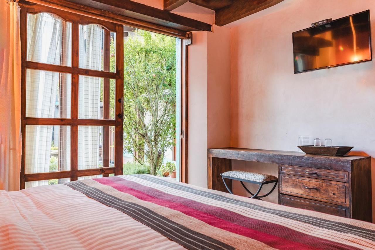 Yox Hotel Boutique San Cristóbal de Las Casas Exterior foto A room at the hotel